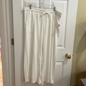 Fresh produce, new with tags. White wide leg pants with pockets. Size 1x
